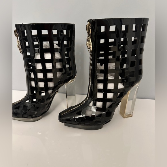 Versace Boots 
Glamorous and stylistic. This statement piece was  worn once. - Picture 5 of 12